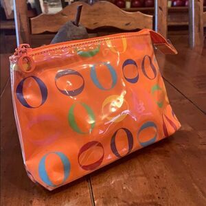Never used Rare Oprah Orange O Logo Cosmetic bag.